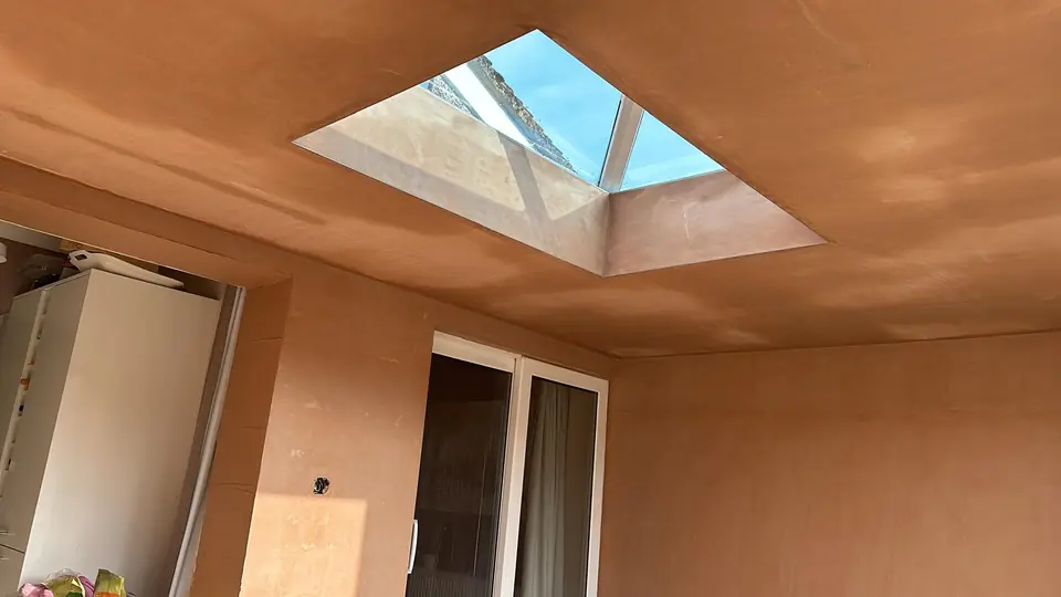 Orangery interior plastered and finished under a roof lantern